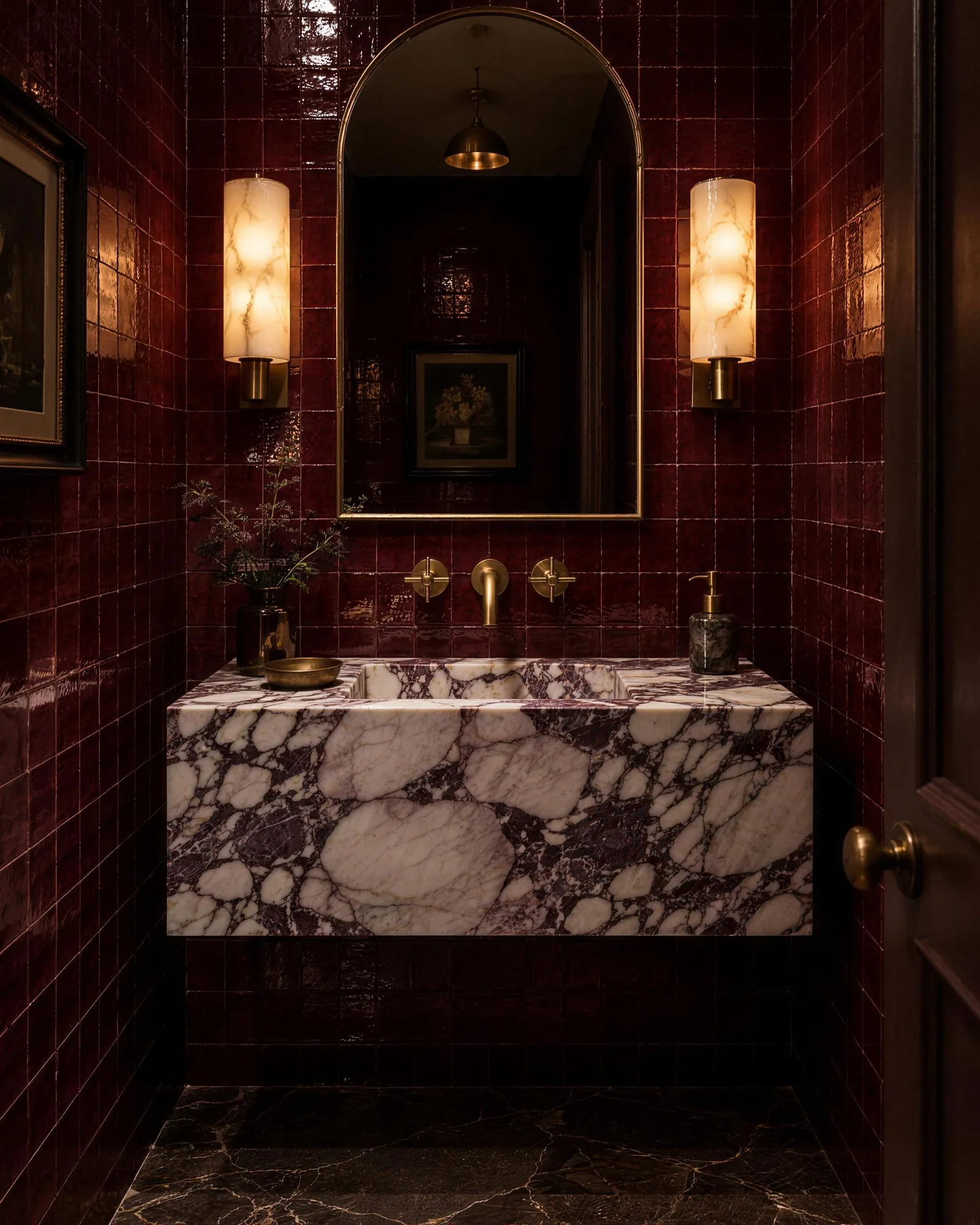 Concept powder room with oxblood zellige tile, a Calacatta Viola marble vanity and brass fittings